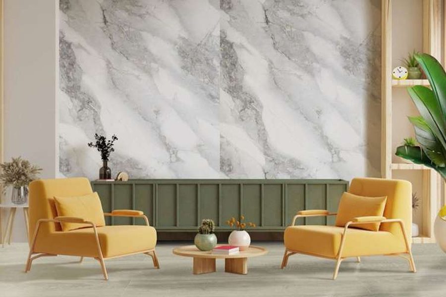 Marble-look wall panel and wood-look flooring in a living room