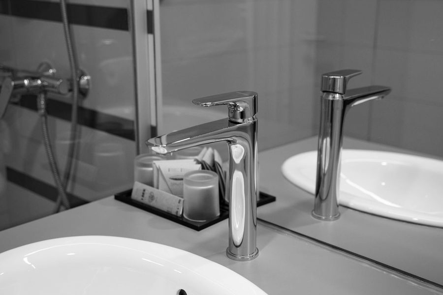 Modern chrome faucet and ceramic sink